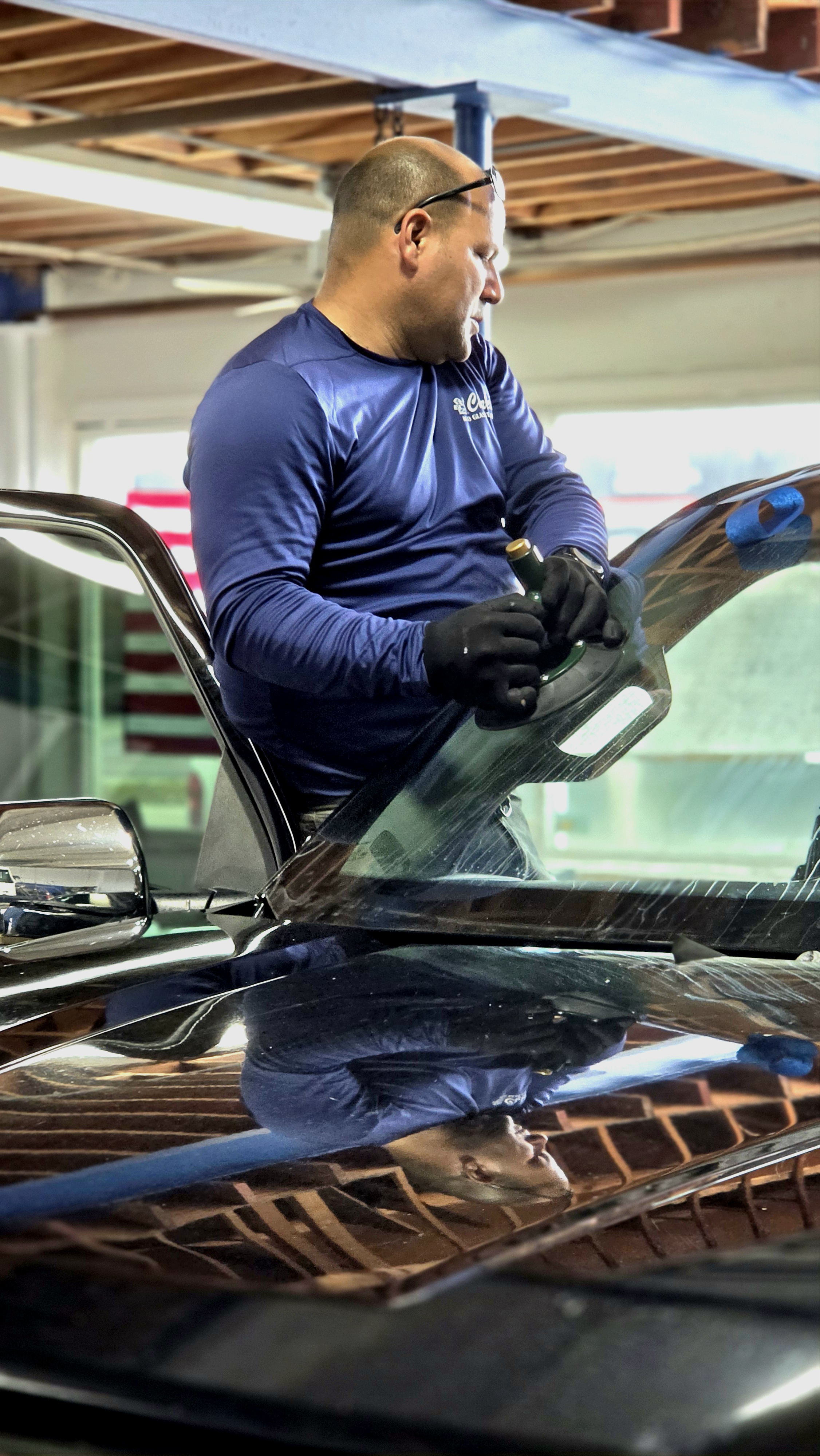 Windshield replacement technician